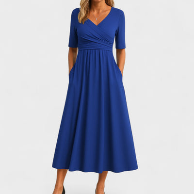Odilia | Midi-jurk met flatterende taille en vloeiende lijn