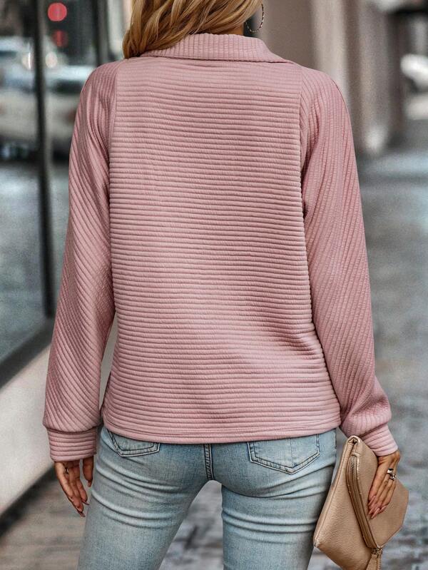 Céline | V-hals trui met ritsdetail