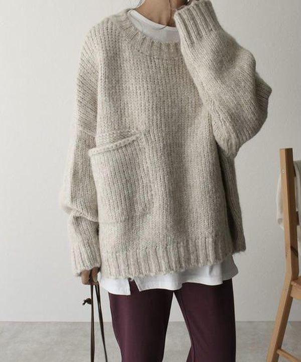Noëlle | Oversized ivoorwitte trui met frontzak