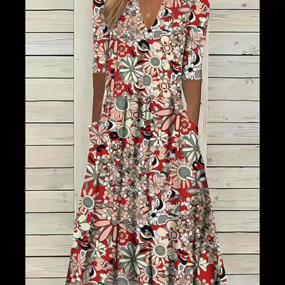 Odette | Midi-jurk met bloemenprint, V-hals en asymmetrische zoom