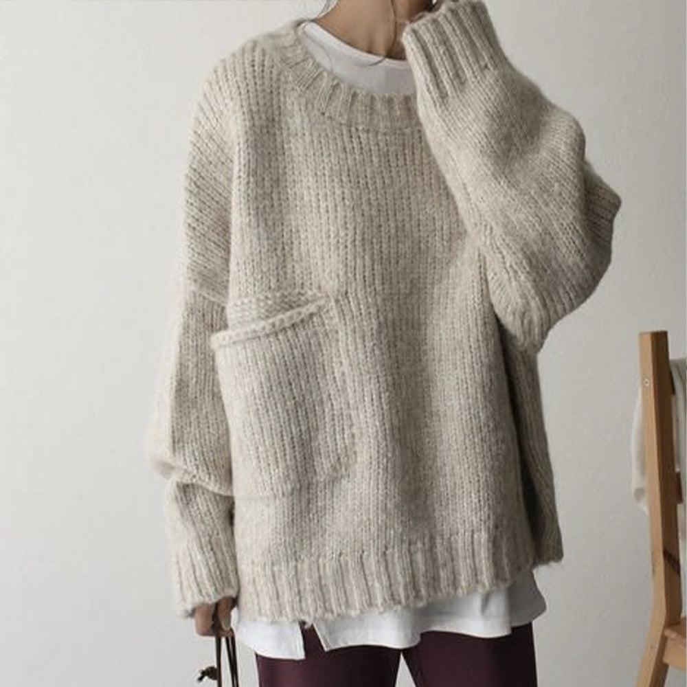 Noëlle | Oversized ivoorwitte trui met frontzak