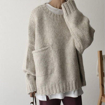 Noëlle | Oversized ivoorwitte trui met frontzak