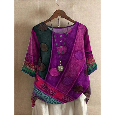 Noëlla | Patchwork top met artistiek design en knoopdetail