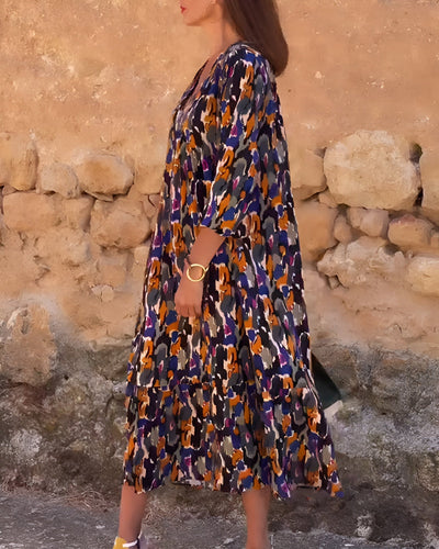 Renée | Vintage jurk met V-hals en romantische mouwen