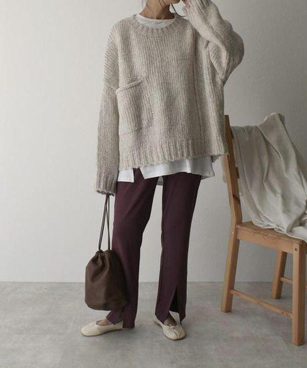 Noëlle | Oversized ivoorwitte trui met frontzak
