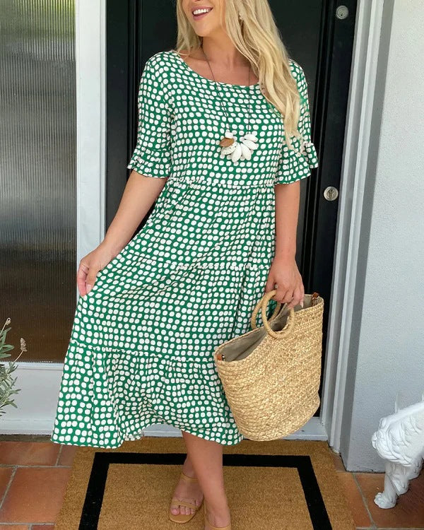Isaline | Midi-jurk met ruches en speelse stippenprint