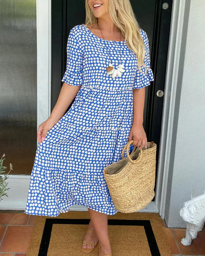 Isaline | Midi-jurk met ruches en speelse stippenprint