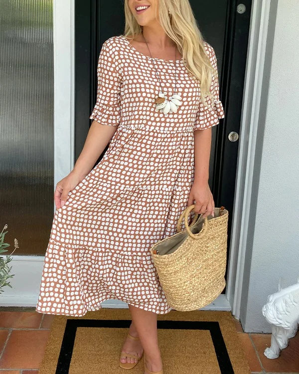 Isaline | Midi-jurk met ruches en speelse stippenprint