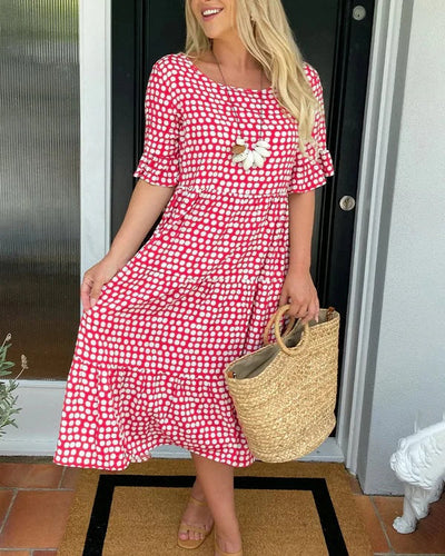 Isaline | Midi-jurk met ruches en speelse stippenprint