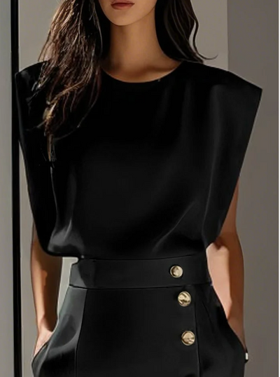 Sylvie | Ivoorkleurige powerdress met gouden details en tailleaccent