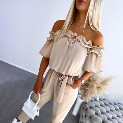 Noëlle | Off-shoulder jumpsuit met striklint en sierlijke ruches
