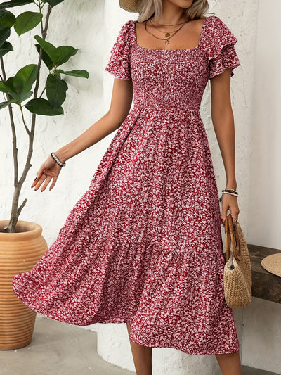 Florine | Midi-jurk met bloemenprint en rucherand